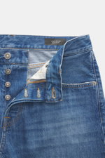Dondup Jeans 'Icon Relax' blau, Nahaufnahme von offenem Bund mit Button Fly, reine Baumwolle, Five-Pocket-Stil, Used-Waschung, Distressed-Effekte.