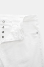 Close-up front view of Dondup Jeans 'Icon Relax' offwhite, showing button fly and five-pocket style in denim cotton with slightly elastic, textured feel, Icon Relax Fit (Tapered Fit), regular thigh width, ankle-length.
