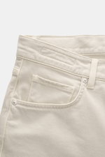Close-up rear view of Barmas Venezia Jeans 'Denver' beige showing embossed leather patch, five-pocket style, button fly, made from cotton with cashmere, slightly elastic, soft touch, Regular Fit, tapered slim fit.