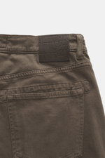 Close-up rear view of Barmas Venezia Jeans 'Denver' brown showing the embossed leather patch, five-pocket style, button fly, tapered slim fit denim made from cotton with cashmere, slightly elastic quality, soft touch, and regular fit.