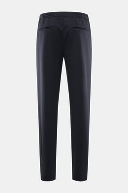 Rear view of Emporio Armani Jersey-Jogpants navy in regular fit, made from soft, elastic modal-cotton mix with elastic waistband, zippered front pockets, and back welt pockets. Zeitloser Stil trifft Komfort: Die Jogpants von EMPORIO ARMANI überzeugt mit f