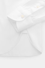Close-up top-down view of Borrelli Business Shirt 'Luciano' Shark Collar white cuff, showcasing twill cotton, mother-of-pearl button, and fine tailoring details.