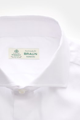 Close-up front view of Borrelli Business Shirt 'Nando' Shark Collar white, showcasing pure cotton, soft touch, fine weave, slim fit, French button placket with mother-of-pearl buttons, classic sport cuff, rounded hemline, and masterful Neapolitan tailorin