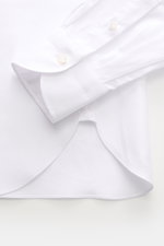 Borrelli Business Shirt 'Nando' Shark Collar white shown from a close-up top angle, highlighting pure cotton fabric, slim fit, shark collar, French button placket with mother-of-pearl buttons, classic sport cuff, and rounded hemline, exemplifying masterfu