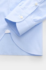 Close-up front view of Borrelli Business shirt 'Nando' shark collar light blue/white checked showcasing fine cotton poplin, slim fit, French button placket with mother-of-pearl buttons, classic sport cuff, and soft smooth texture.