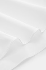 Close-up of the Finamore Business Shirt 'Sergio Napoli' Shark Collar White showing the smooth white twill fabric from Egyptian Giza-45 cotton, photographed from the side to highlight the fabric texture and neat stitching. Stylish in the office: The 'Sergi