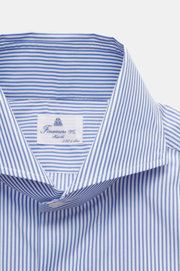 Close-up front view of the Finamore Business Shirt 'Sergio Napoli' Shark Collar blue/white striped, showcasing the smooth, pure Giza cotton fabric, shark collar, French placket, classic sport cuff, extra-long sleeves, regular fit, and rounded hemline, hig