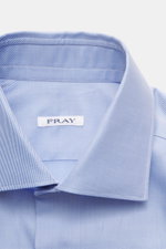 Fray Business Shirt Shark Collar 'Nello' light blue shown close-up from front top angle, made of pure cotton gabardine with soft touch, slim fit, shark collar, classic sport cuff, and slightly rounded hem.