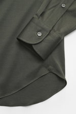 Fray Jersey Shirt Kent Collar 'Gabriel' Dark Green shown from a close-up side angle, highlighting the cuff and hem details; pure cotton, soft touch, Slim Fit, Kent collar, classic sport cuff, back waist darts, extended back.