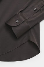 Close-up view from above of the cuff and lower section of the Fray Jersey shirt kent collar 'Gabriel' dark gray, featuring pure cotton, soft touch, slim fit, kent collar, classic sport cuff, back waist darts, and extended back.