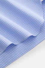 Close-up front view of Borrelli Business shirt 'Nando' shark collar blue/white checked fabric showing pure cotton popeline with light smooth touch, classic striped pattern, slim fit, shark collar, French button placket with mother-of-pearl buttons, classi