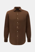 Front view of a brown Polo Ralph Lauren Cord-Hemd Haifisch-Kragen braun made of pure cotton corduroy with shark collar, soft touch, regular fit, brand logo on chest, French button placket, classic sport cuffs, and rounded hem. <p>Stilvoll durch die neue S