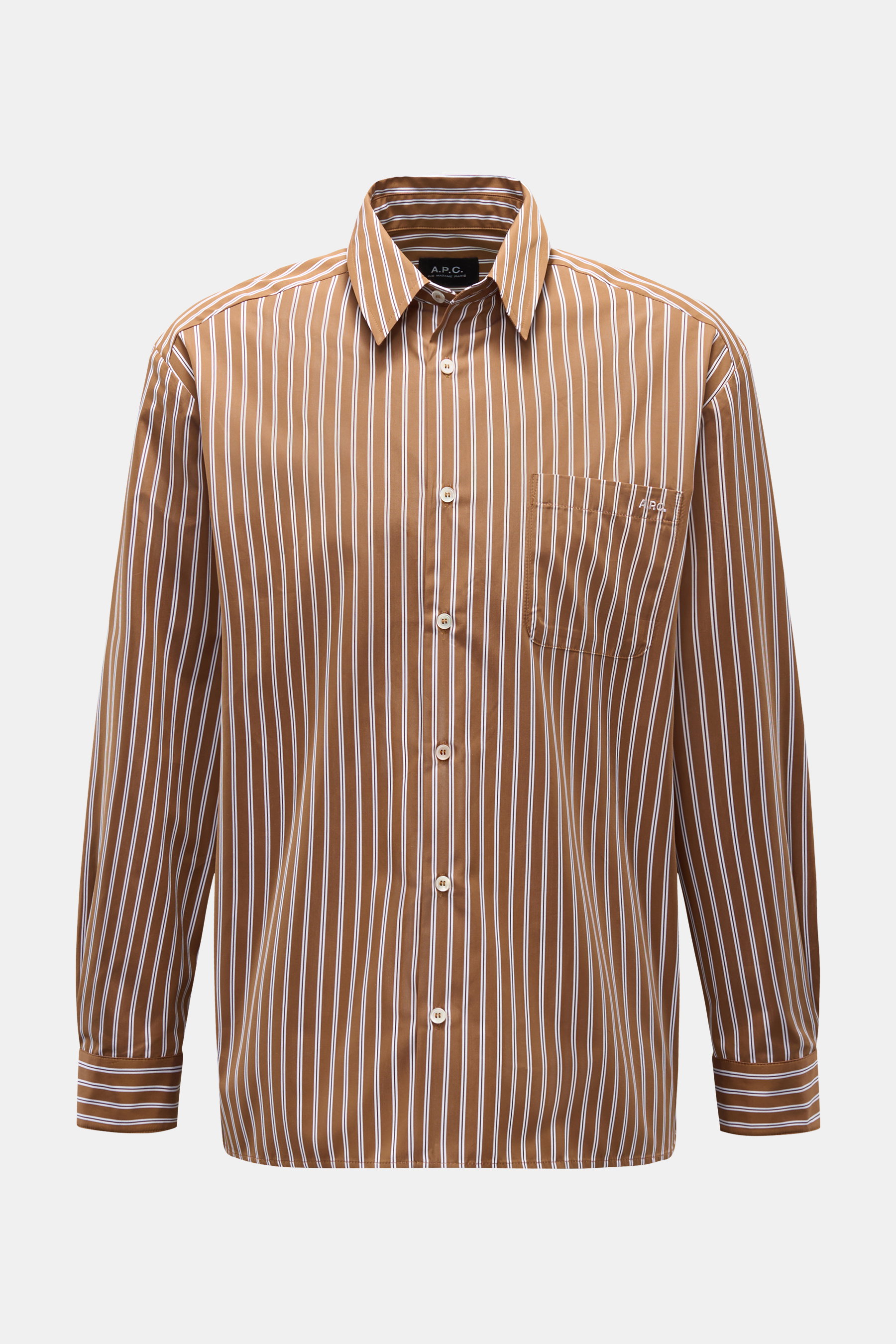 Front view of A.P.C. Casual shirt Kent collar brown/black/white striped with pure cotton, smooth feel, oversized fit, Kent collar, French button placket, classic barrel cuffs, patch breast pocket with stitching, and slightly rounded hem, a modern take on 