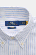 Polo Ralph Lauren Linen shirt button-down collar white/light blue striped, close-up front view of collar and label, summer classic, slim fit, linen plain weave, soft feel, lightweight fabric, button-down collar, patch button placket, signature logo stitch