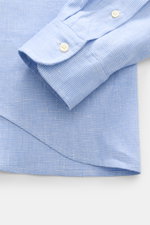 Nahaufnahme von Manschette und Saum des Polo Ralph Lauren Oxford-Hemd Haifisch-Kragen hellblau/weiß kariert, Oxford aus Leinen/Baumwolle, Slim Fit, weicher Griff, elastisch, klassisches Karomuster, französische Knopfleiste, Sportmanschette, gerundeter Sau