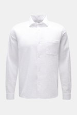 Front view of the 04651/ A trip in a bag Seersucker shirt Kent collar white, featuring pure cotton seersucker fabric, Kent collar, French button placket, patch breast pocket, classic barrel cuffs, and slightly rounded hem with short vents. 

<p><span clas