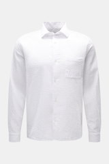 Front view of the 04651/ A trip in a bag Seersucker shirt Kent collar white, featuring pure cotton seersucker fabric, Kent collar, French button placket, patch breast pocket, classic barrel cuffs, and slightly rounded hem with short vents. 

<p><span clas