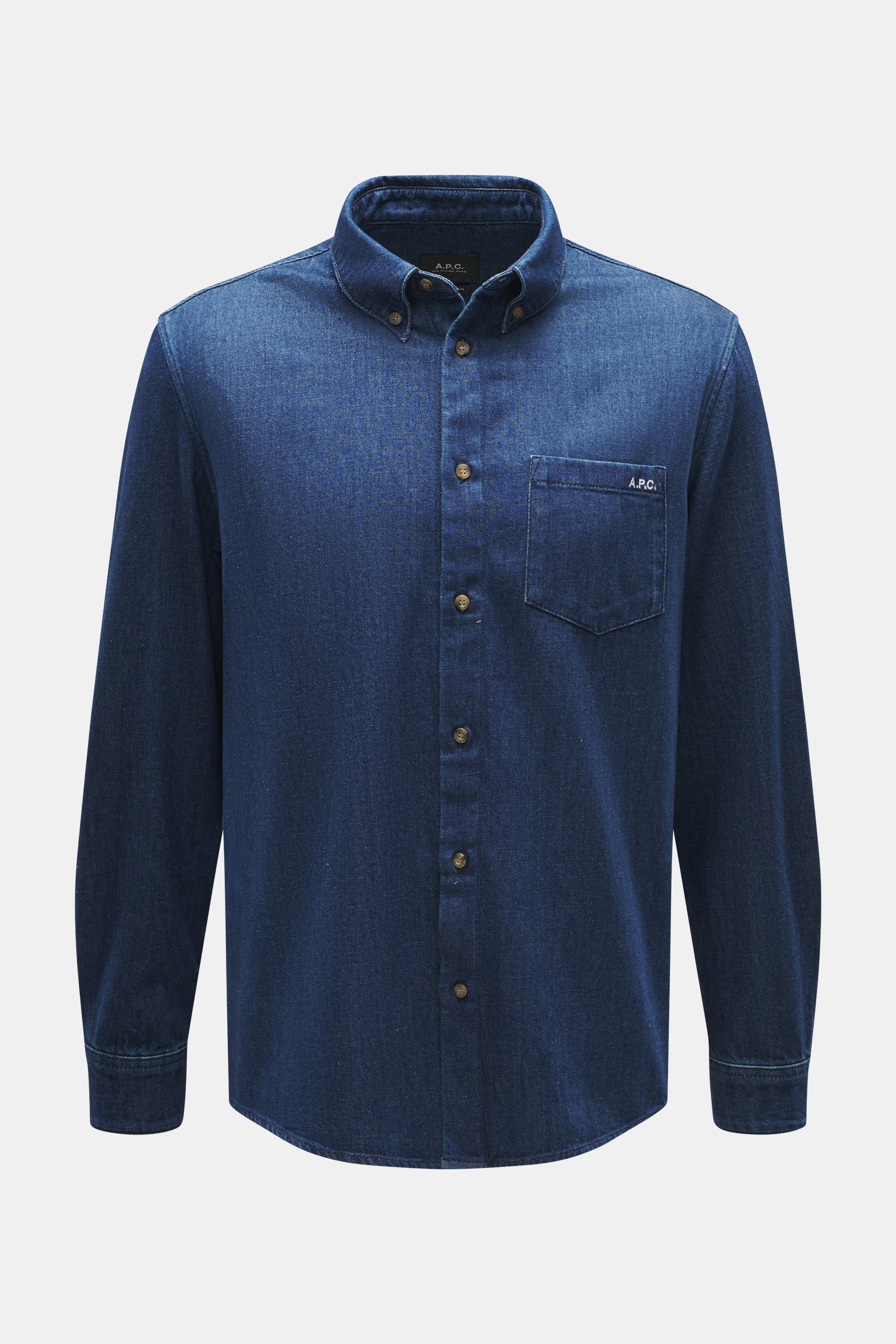 Front view of A.P.C. Jeans Shirt 'Greg' navy, pure cotton, soft touch, oversized with button-down collar, patch chest pocket, French button placket, subtle logo stitching, classic sport cuff, and rounded hemline.