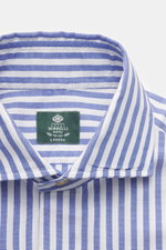 Close-up front view of Borrelli Oxford shirt 'Ettore' shark collar blue/white striped, pure cotton, soft touch, slim fit, hand-sewn, French placket with mother-of-pearl buttons, classic sport cuff, back waist darts, rounded hem.