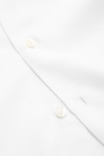 Close-up front view of Finamore Casual Shirt 'Lucio Napoli' Button-Down Collar White showing gabardine cotton-silk fabric, very soft feel, extra long sleeves, regular fit, button-down collar, French placket with mother-of-pearl buttons, classic sport cuff