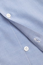 Close-up front angle view of the Finamore Casual Shirt 'Lucio Napoli' Button-Down Collar blue/white melange showing fine blue stripes, white mother-of-pearl buttons, and fabric texture. Gabardine made of cotton and silk, very soft feel, extra long sleeves