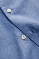 Close-up front view of Giampaolo Flanellhemd Haifisch-Kragen graublau meliert with buttons, soft twill cotton fabric, and detailed stitching.

<p>Alltagstauglicher Klassiker: Das edle Flanellhemd des italienischen Labels GIAMPAOLO aus reiner Baumwolle w