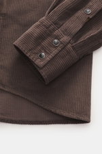 Jacob Cohen Corduroy Shirt Narrow Collar Dark Brown, close-up side view of sleeve and hem, corduroy pure cotton, soft touch, slim fit, narrow collar, snap button placket, western yoke, breast pockets, label stitching, double button cuff, rounded hemline.