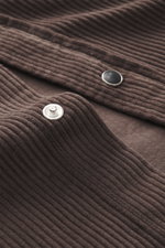 Close-up view of the Jacob Cohen Corduroy Shirt Narrow Collar Dark Brown showing snap button placket on ribbed corduroy made of pure cotton with a soft touch.