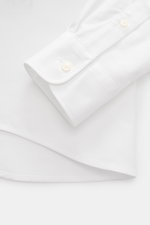 Close-up view of the Ami Paris Oxford Shirt Button-Down Collar White cuff and hem, pure cotton with button placket.

Description:  
<p>Classic modern interpretation: The Oxford shirt by AMI PARIS in a classic design becomes the everyday companion for ever
