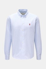 Ami Paris Casual Shirt Button-Down Collar Light Blue/White Striped shown from front, featuring pure cotton, soft touch, oversized fit, classic stripe design, patch button placket, classic sport cuff, and slightly rounded hemline; modern interpretation of 