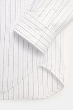 Close-up front-side view of Maison Kitsuné Oxford Shirt Button-Down Collar white/light blue/black striped sleeve and hemline, Oxford made of pure cotton, soft touch, regular fit, button-down collar, patch button placket, brand-typical logo stitching, clas