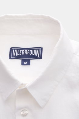 Close-up front top view of the Vilebrequin Linen shirt slim collar white, showcasing lightweight fabric, soft feel, regular fit, narrow collar, French button placket, classic barrel cuffs, patch breast pocket, rounded hem, and tonal stitching on the hem.