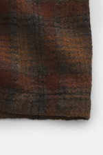 Close-up front view of the Barena Venezia Overshirt brown/grey checkered fabric, pure virgin wool with a slightly textured feel, Regular Fit, four-button placket, turn-down collar, patch chest pocket, buttoned sleeve cuffs, unconstructed design, and one i