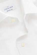 Close-up view of the Gherardi Casual shirt shark collar white, showing the white twill made of cotton and cashmere soft flannel, slim fit, shark collar, French button placket, classic sport cuff, split back yoke, rear waist darts, and rounded hemline.