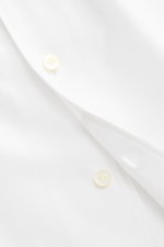Close-up front view of the Gherardi Casual shirt shark collar white showing twill cotton cashmere fabric, soft flannel, slim fit, shark collar, French button placket, sport cuff, split back yoke, rear waist darts, and rounded hemline.