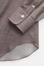 Close-up front angled view of Gherardi Casual shirt shark collar grey brown melange, showing soft flannel twill made of cotton and cashmere, slim fit, classic sport cuff with button, french button placket, split back yoke, rear waist darts, and rounded he