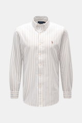 Front view of Polo Ralph Lauren Oxford shirt button-down collar off-white/blue/black striped with classic barrel cuffs and polo player stitching.

Description: 
<p>Timeless Oxford elegance: This shirt by POLO RALPH LAUREN combines a sporty character with 