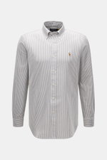 Front view of Polo Ralph Lauren Oxford Shirt Button-Down Collar Black/White Striped, made of pure cotton with striped pattern, button-down collar, chest logo embroidery, pleated back yoke, and rounded hem, showcasing its slim fit and classic sport cuffs. 