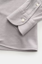 Close-up front view of the slim fit Sonrisa Jersey shirt shark collar grey, showing elastic cotton-lyocell fabric, French button placket, classic barrel cuffs, slightly rounded hem, and small woven label.

<p>Comfort meets style: This jersey model in a so