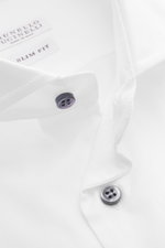 Close-up top-down view of the Brunello Cucinelli Casual Shirt Shark Collar White showing pure cotton gabardine fabric, slim fit, French placket, contrasting mother-of-pearl buttons, shark collar, classic sport cuff, and slightly rounded hemline.

Addition