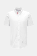 Front view of Thom Browne Short-sleeve shirt button-down collar white in pure cotton Oxford fabric with patch pocket and button placket.