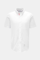 Front view of Thom Browne Short-sleeve shirt button-down collar white in pure cotton Oxford fabric with patch pocket and button placket.