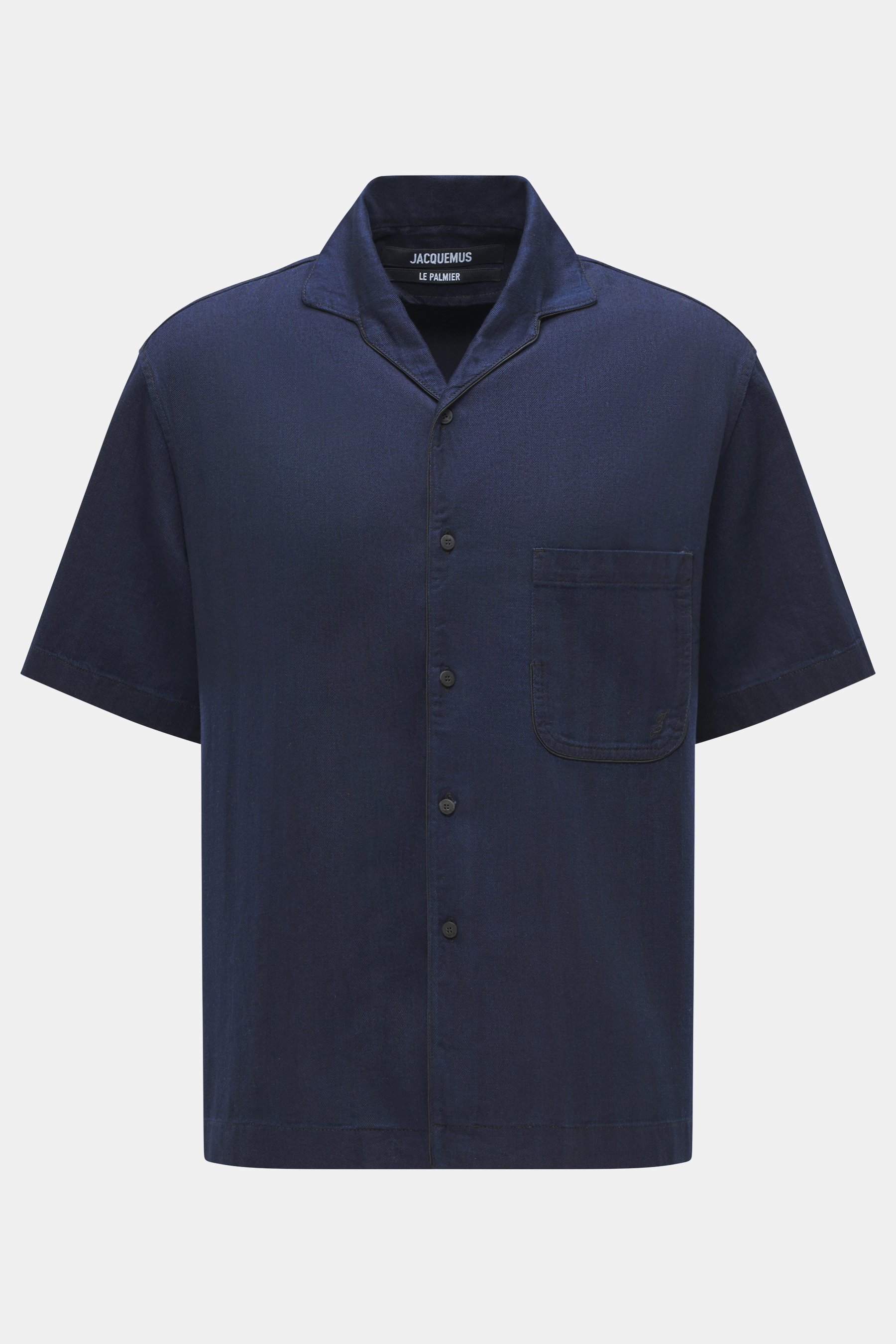 Front view of Jacquemus Denim short sleeve shirt dark blue made of pure cotton, featuring regular fit, open collar, patch chest pocket, and decorative J-loop.