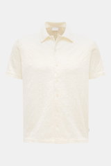 Frontale Nahaufnahme des 04651/ A trip in a bag Jersey-Kurzarmhemd 'Abstract' Kubanischer Kragen creme mit Strukturmuster, Regular Fit, variabler Kragen, französischer Knopfleiste, kurzen Saumschlitzen und kleinem Weblabel aus reiner, atmungsaktiver Baumw