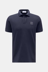 Front view of Stone Island Polo shirt navy in pure cotton piqué, slim fit with signature collar, two-button placket, fabric label, flexible cuffs, side vents.  
<p>The classic from STONE ISLAND: This sporty polo shirt in cotton piqué is a casual men’s war