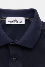 Stone Island Polo shirt navy shown from a close-up top front perspective, featuring a classic collar, two-button placket, slim fit, and fabric label.  
<p>The classic from STONE ISLAND: This sporty polo shirt in cotton piqué is a casual men’s wardrobe mus