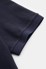 Close-up side view of navy sleeve cuff of Stone Island Polo shirt navy in pure cotton piqué with textured touch and flexible cuff.

<p>The classic from STONE ISLAND: This sporty polo shirt in cotton piqué is a casual men’s wardrobe must-have.</p>
<ul>
<li