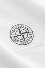 Close-up front-side view of Stone Island Jersey-polo shirt white showing the embroidered fabric label on soft pure cotton jersey fabric.

<p>This lightweight polo shirt is a must-have for sporty men’s wardrobes: Made of cotton jersey, this timeless model 