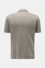 Rear view of the 04651/ A trip in a bag Linen jersey polo shirt grey-green, showing its slim fit, short sleeves, dress-shirt collar, and slightly elasticated, breathable linen fabric. This casual, piece-dyed jersey polo shirt from 04651/ A TRIP IN A BAG i