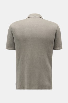Rear view of the 04651/ A trip in a bag Linen jersey polo shirt grey-green, showing its slim fit, short sleeves, dress-shirt collar, and slightly elasticated, breathable linen fabric. This casual, piece-dyed jersey polo shirt from 04651/ A TRIP IN A BAG i